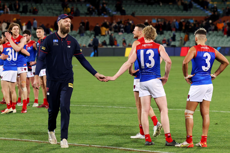 ADELAIDE, AUSTRALIA - JULY 02: Max Gawn and Clayton Oliver of the Demons celebrate their win during the 2022 AFL Round 16 match between the Adelaide Crows and the Melbourne Demons at the Adelaide Oval on July 02, 2022 in Adelaide, Australia. (Photo by James Elsby/AFL Photos via Getty Images)