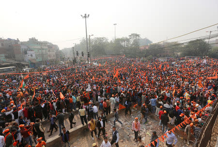 Supporters of the Vishva Hindu Parishad (VHP), a Hindu nationalist organisation, arrive to attend "Dharma Sabha" or a religious congregation organised by the VHP in New Delhi, India, December 9, 2018. REUTERS/Adnan Abidi