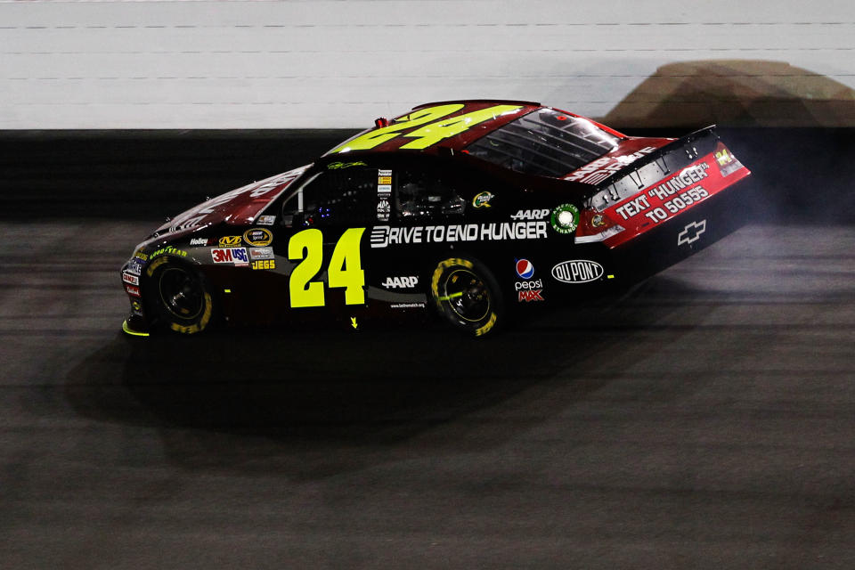 DAYTONA BEACH, FL - FEBRUARY 27: Jeff Gordon, driver of the #24 Drive to End Hunger Chevrolet, stays off the wall after an engine failure during the NASCAR Sprint Cup Series Daytona 500 at Daytona International Speedway on February 27, 2012 in Daytona Beach, Florida. (Photo by Streeter Lecka/Getty Images)