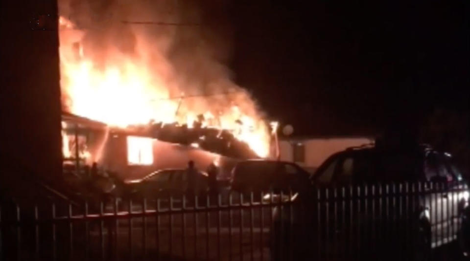 A house on fire at Brittcliffe Close in Singleton on Wednesday morning. Two girls, both aged 5, and an 11-year-old boy, died in the fire. A woman, 31, and a boy, 8, are in hospital in a stable condition.