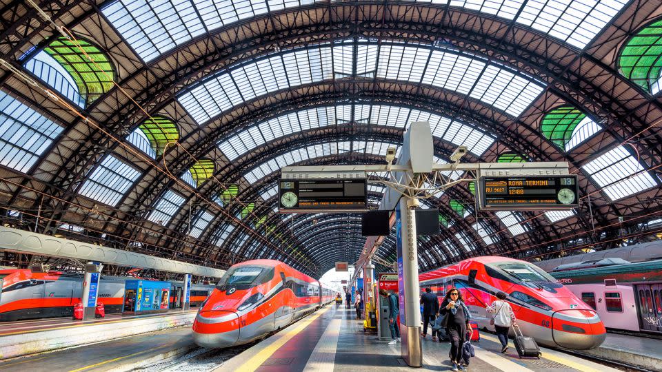 Make the most of Europe's extensive train system. Modern, high-speed trains are seen at Milan Central Station in Italy. - scaliger/iStock Editorial/Getty Images