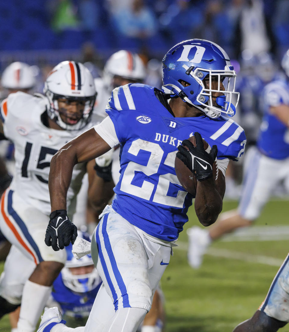 Duke's Jaylen Coleman (22) carries the ball during the first half of an NCAA college football game against Virginia in Durham, N.C., Saturday, Oct. 1, 2022. (AP Photo/Ben McKeown)