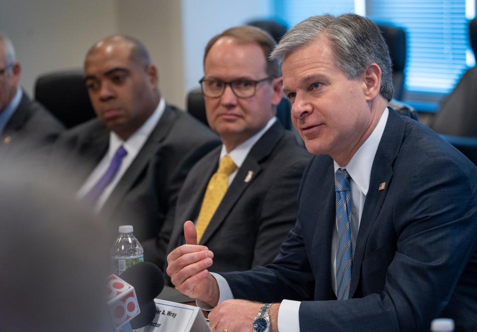 Christopher Wray, director of the FBI, speaks to the press before the U.S. Attorney’s Office and Law Enforcement Partners meeting Thursday, March 30, 2023 in the FBI Indiana Headquarters.