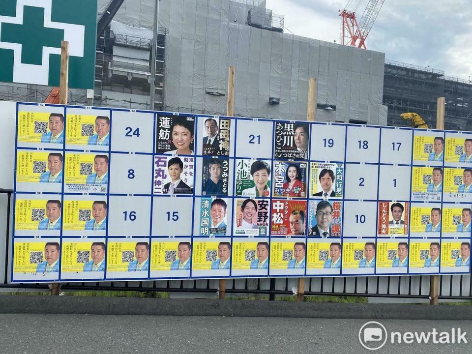 東京知事選舉這次出現有N國黨推出24名後選人，其實是卡住看板位置，出賣看板位置來收捐款，因此出現許多與選舉無關照片及業者宣傳。   圖：劉黎兒攝