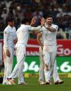 England's James Anderson (right) took three wickets on his return to the Test side