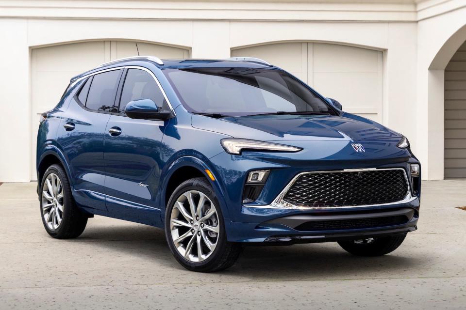 Front 3/4 view of the 2024 Buick Encore GX Avenir in Ocean Blue Metallic.