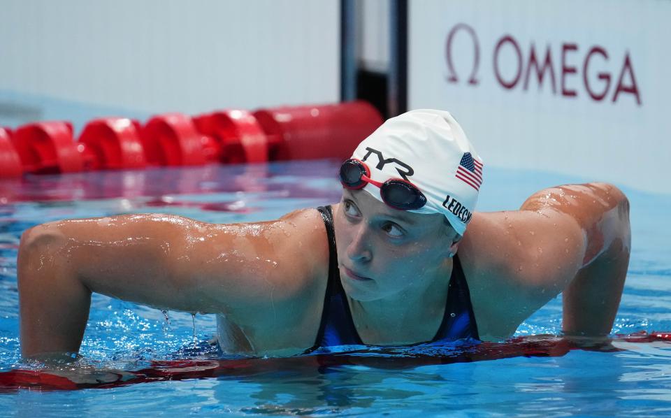 Katie Ledecky looked for her time after the 200 freestyle heats on Monday.