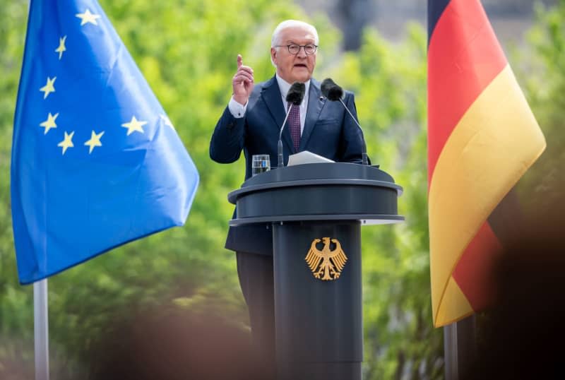 German President Frank-Walter Steinmeier speaks during the state ceremony to mark "75 years of the Basic Law" on the forum between the Bundestag and the Federal Chancellery. The Basic Law of the Federal Republic of Germany was promulgated on May 23, 1949 and came into force the following day where the anniversary will be celebrated with a three-day democracy festival from 24 to 26 May 2024 in Berlin's government district. Michael Kappeler/dpa