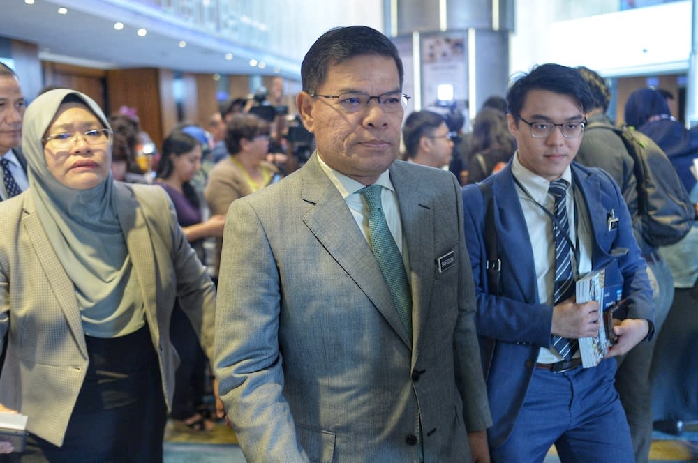 Domestic Trade and Consumer Affairs Minister Datuk Seri Saifuddin Nasution Ismail speaks to reporters after the launch of the World Bank’s Malaysia Economic Monitor report in Kuala Lumpur December 9, 2019. — Picture by Shafwan Zaidon