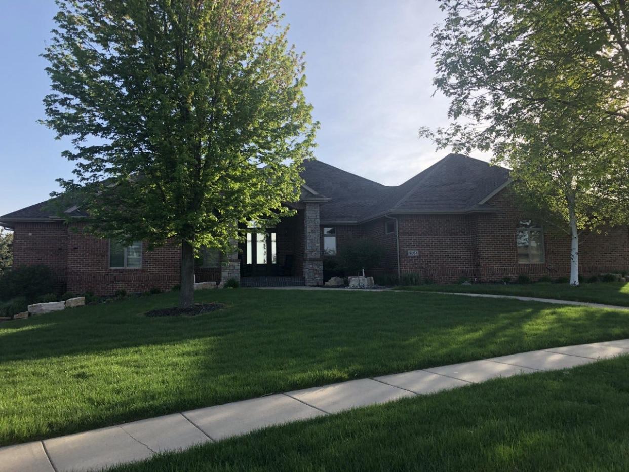 The top home at 7504 S. Ridgestone Drive features four bedrooms and four bathrooms across 2,962 square feet.