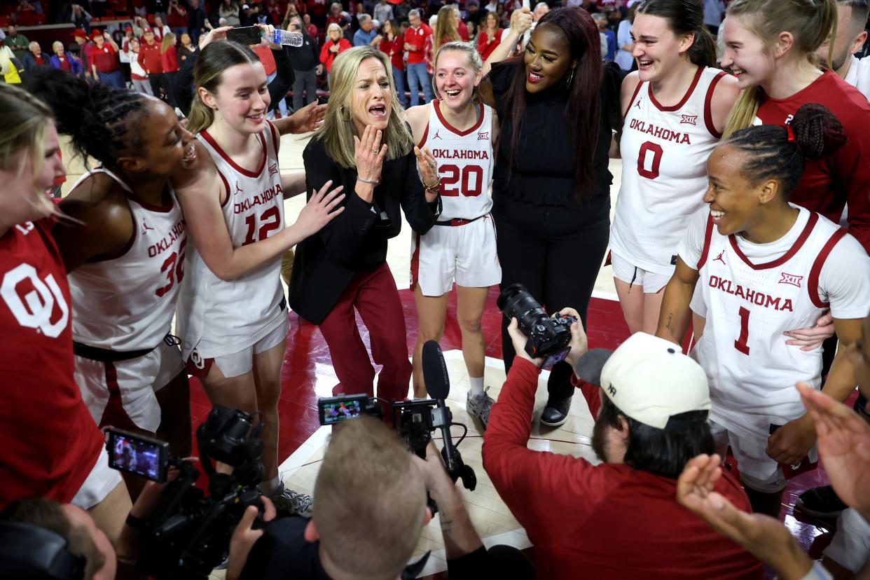 Oklahoma coach Jennie Baranczyk becomes emotional as she speaks with her team after beating Texas in a women's college basketball game between the University of Oklahoma Sooners (OU) and the Texas Longhorns at Lloyd Noble Center in Norman, Okla., Wednesday, Feb. 28, 2024. Oklahoma won 71-70.