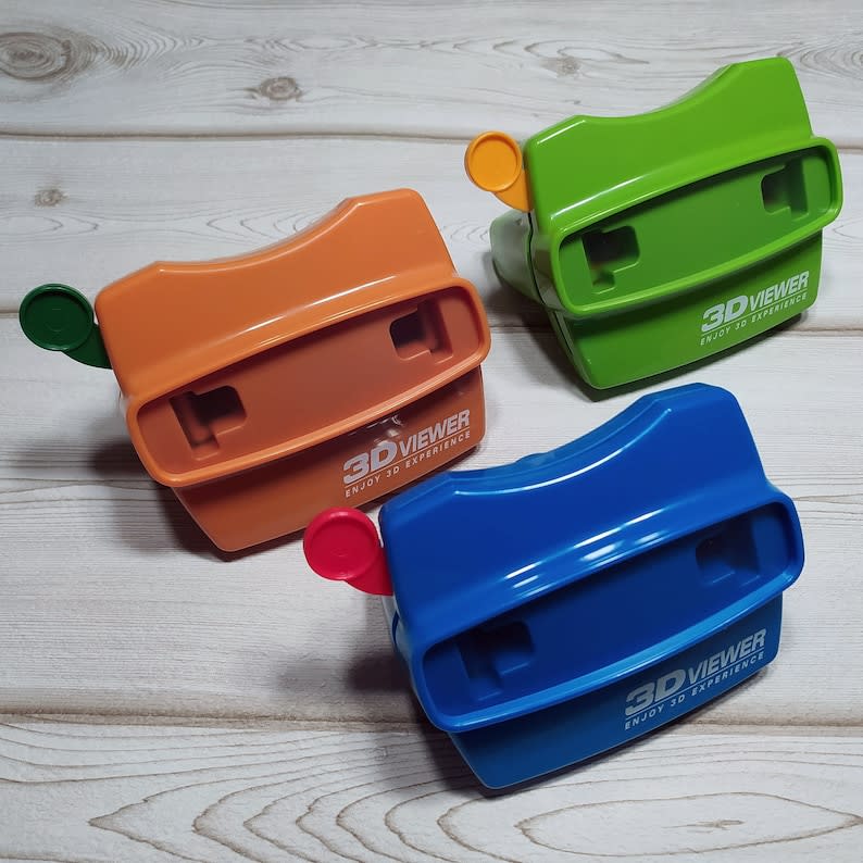 <p><a href="https://go.redirectingat.com?id=74968X1596630&url=https%3A%2F%2Fwww.etsy.com%2Flisting%2F638495283%2Fpersonalised-viewmaster-style-custom&sref=https%3A%2F%2Fwww.redbookmag.com%2Flife%2Ffriends-family%2Fg44450245%2Fphoto-gifts%2F" rel="nofollow noopener" target="_blank" data-ylk="slk:Shop Now;elm:context_link;itc:0;sec:content-canvas" class="link ">Shop Now</a></p><p>Personalized Viewmaster </p><p>$23.71</p><p>etsy.com</p><span class="copyright">DrZuschuss</span>