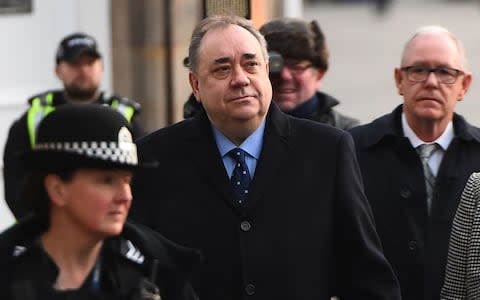 Alex Salmond (C) arrives for a preliminary hearing over allegations of sexual harassment, at the High Court in Edinburgh - Credit: AFP