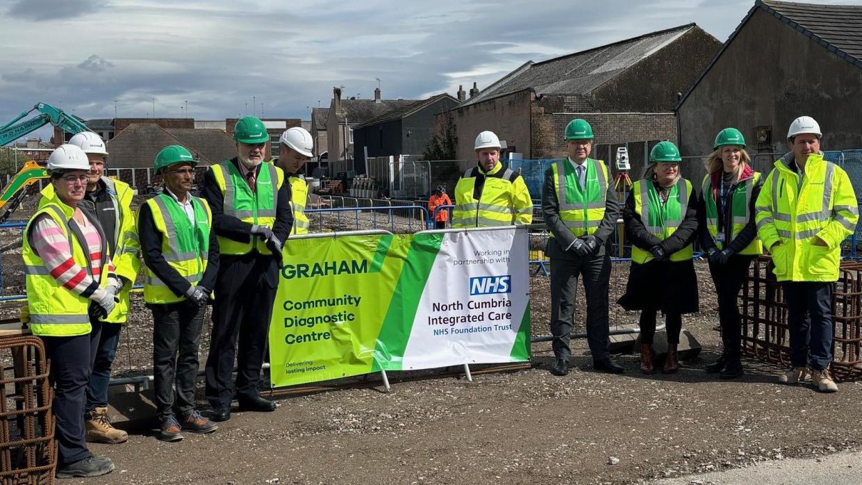 People standing on a building site