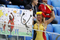 <p>Belgium fan smiles in St Petersburg </p>