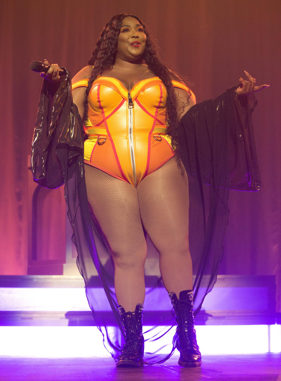 FILE - This Sept. 18, 2019 file photo shows Lizzo performing at The Met in Philadelphia. Mina Lioness’ longstanding battle to finally receive writing credit on Lizzo’s megahit song “Truth Hurts” is paying off in more ways than one: it could win her a potential Grammy Award. Lizzo's breakthrough tune features signature line that originated from a 2017 tweet by Lioness. (Photo by Owen Sweeney/Invision/AP, File)
