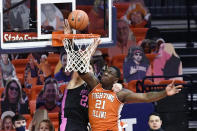 FILE - Illinois center Kofi Cockburn (21) blocks the shot of Penn State forward John Harrar (21) during the first half of an NCAA college basketball game in Champaign, Ill., in this Tuesday, Jan. 19, 2021, file photo. Illinois center Kofi Cockburn was selected to The Associated Press preseason All-America NCAA college basketball team, announced Monday, Oct. 25, 2021. (AP Photo/Holly Hart, File)