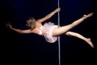 Colombian Elena Mejia competes in the Miss Pole Dance Colombia 2012 competition in Medellin, Antioquia department, Colombia on September 26, 2012. AFP PHOTO/Raul ARBOLEDA