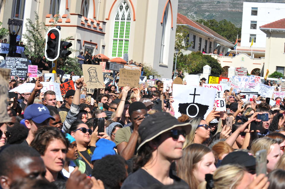 Protesters gather to hand-over a memorandum of grievances during gender-based violence demonstration outside Parliament. Source:  Ziyaad Douglas/Gallo Images via Getty Images.