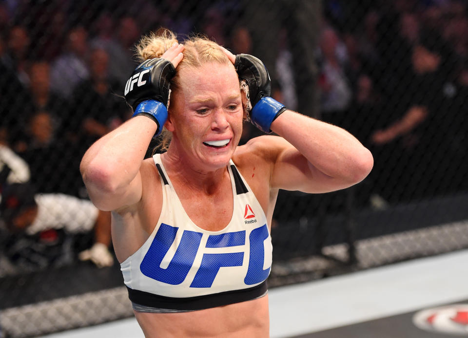 MELBOURNE, AUSTRALIA - NOVEMBER 15:  Holly Holm celebrates her second round KO (headkick and punches) over Ronda Rousey (not pictured) in their UFC women's bantamweight championship bout during the UFC 193 event at Etihad Stadium on November 15, 2015 in Melbourne, Australia.  (Photo by Josh Hedges/Zuffa LLC/Zuffa LLC via Getty Images)