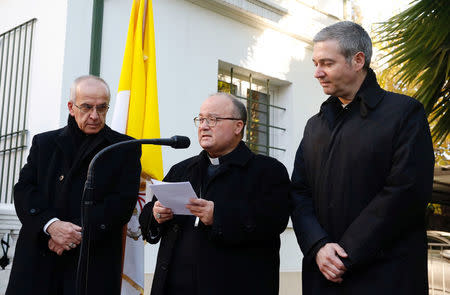 Archbishop Charles Scicluna and father Jordi Bertomeu, Special Vatican envoys, and apostolic nuncio in Chile Ivo Scapolo deliver a news conference in Santiago, Chile June 12, 2018. REUTERS/Rodrigo Garrido