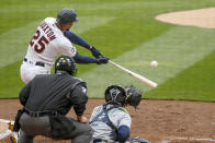 Minnesota Twins' Byron Buxton hits a two-run double against the Seattle Mariners in the third inning of a baseball game Sunday, April 11, 2021, in Minneapolis. (AP Photo/Bruce Kluckhohn)