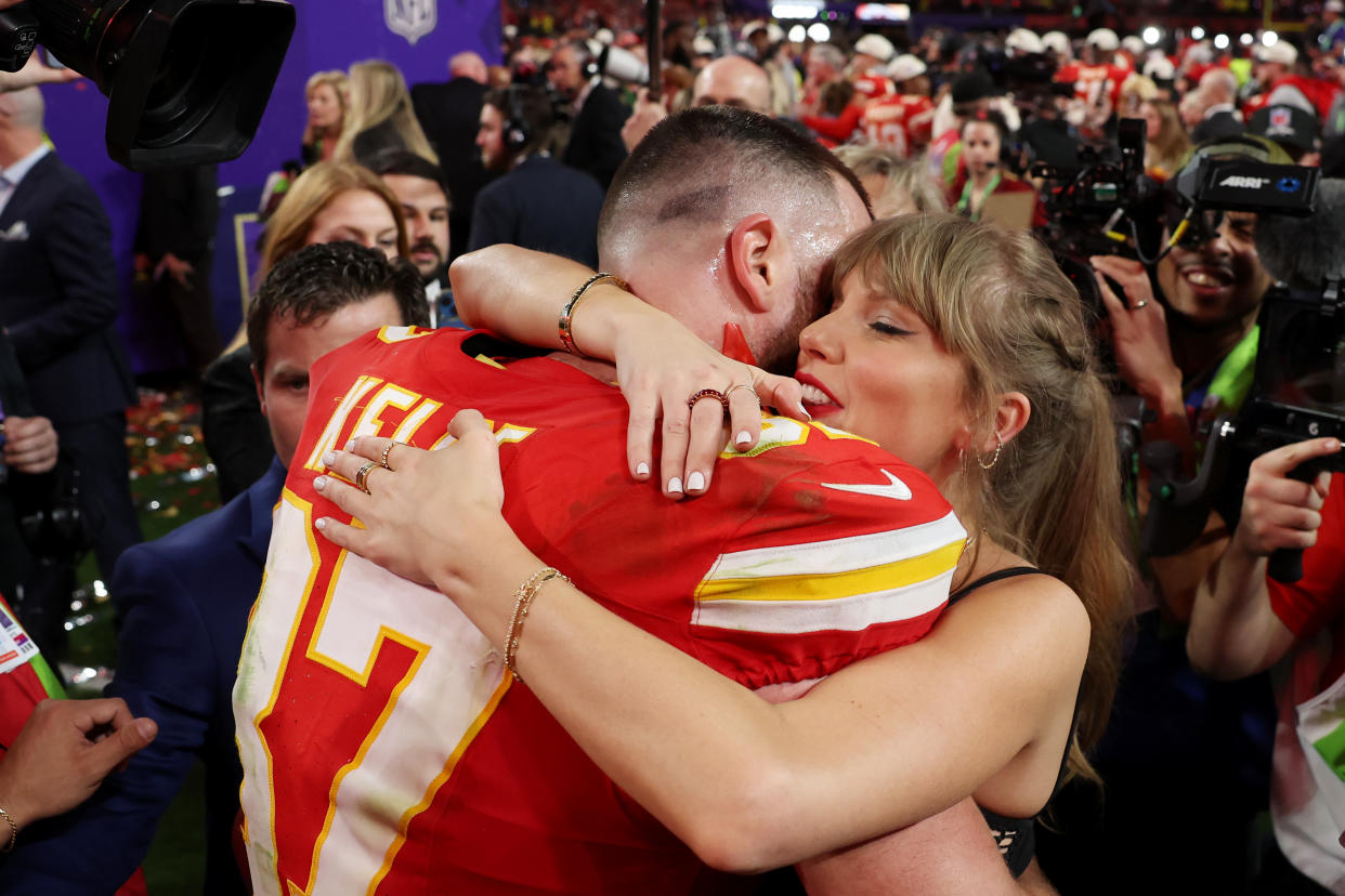 LAS VEGAS, NEVADA - FEBRUARY 11: Travis Kelce #87 of the Kansas City Chiefs and Taylor Swift embrace after defeating the San Francisco 49ers  in overtime during Super Bowl LVIII at Allegiant Stadium on February 11, 2024 in Las Vegas, Nevada. (Photo by Ezra Shaw/Getty Images)