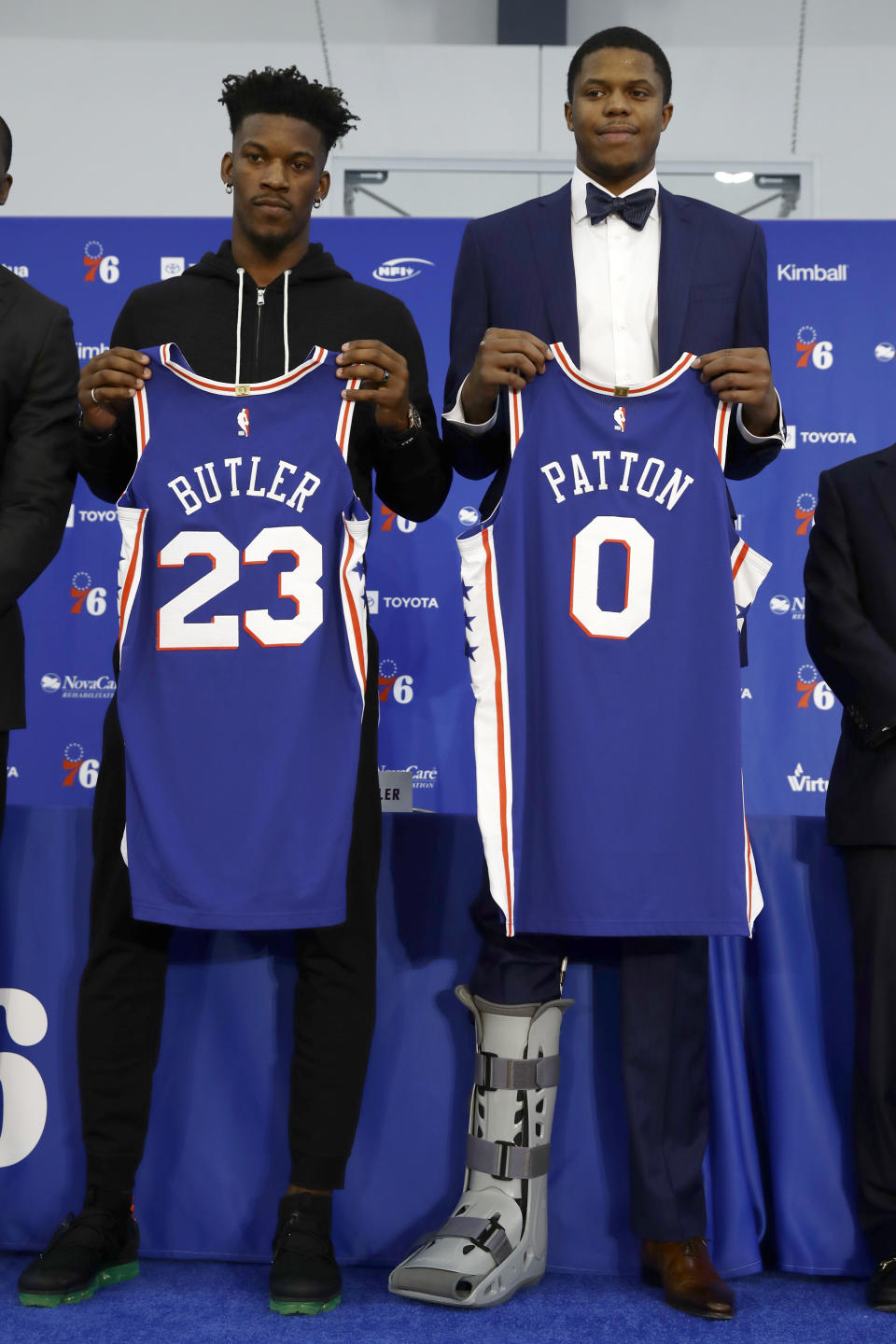 Philadelphia 76ers new players Jimmy Butler, left, and Justin Patton pose during a news conference at the NBA basketball team's practice facility in Camden, N.J., Tuesday, Nov. 13, 2018. (AP Photo/Matt Rourke)