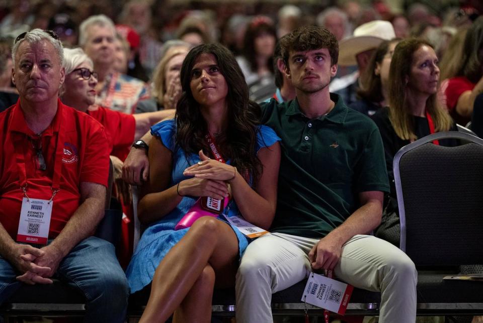 Ella Maulding and Konner Earnest watch as Lt. Governor Dan Patrick speaks during the Texas GOP Convention Thursday, May 23, 2024 in San Antonio.