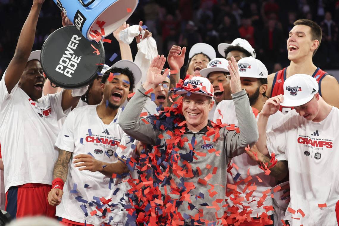 Florida Atlantic Owls head coach Dusty May reacts after having confetti dumped on him following their 79-76 victory against the Kansas State Wildcats in an NCAA tournament East Regional final at Madison Square Garden.