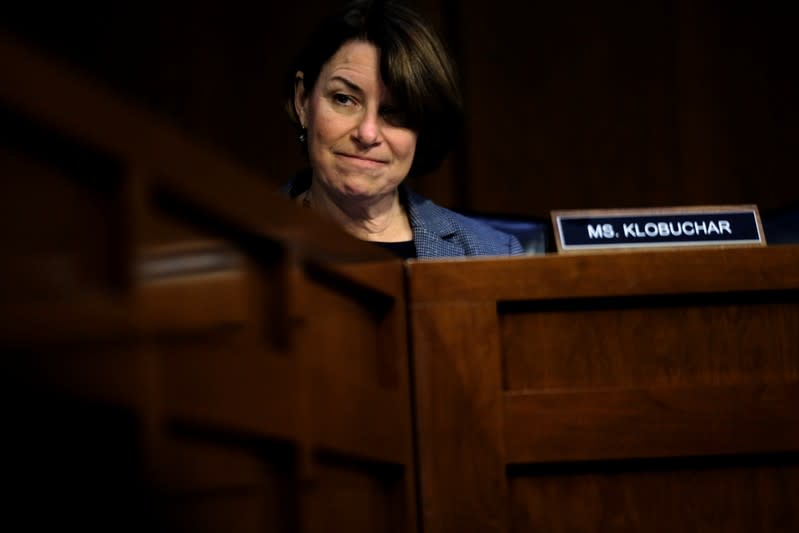 U.S. Senator Amy Klobuchar (D-MN) hears Federal Reserve Board Chairman Jerome Powell testify before a Joint Economic Committee on "The Economic Outlook" on Capitol Hill in Washington