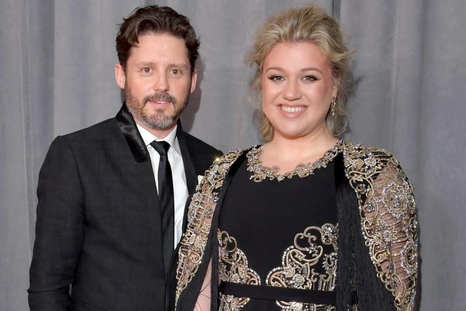 <p>Lester Cohen/Getty</p> Brandon Blackstock and Kelly Clarkson in 2018