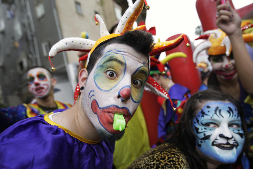 Israelis dressed up in costumes take part in the annual Purim parade in Holon, near Tel Aviv, Israel, Monday, March 1, 2010.  (AP Photo/Ariel Schalit)