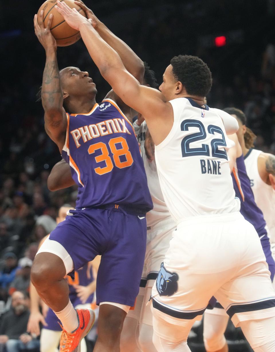 Phoenix Suns guard Saben Lee (38) shoots the ball over Memphis Grizzlies guard Desmond Bane (22) at Footprint Center on Jan. 22, 2023.