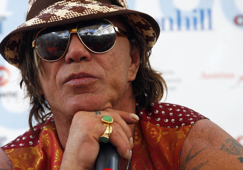 U.S. actor Mickey Rourke listens to questions from reporters and film professionals in Sarajevo August 20, 2009. Rourke is in the Bosnian capital as a guest of the 15th Sarajevo Film Festival. REUTERS/Danilo Krstanovic (BOSNIA AND HERZEGOVINA ENTERTAINMENT)
