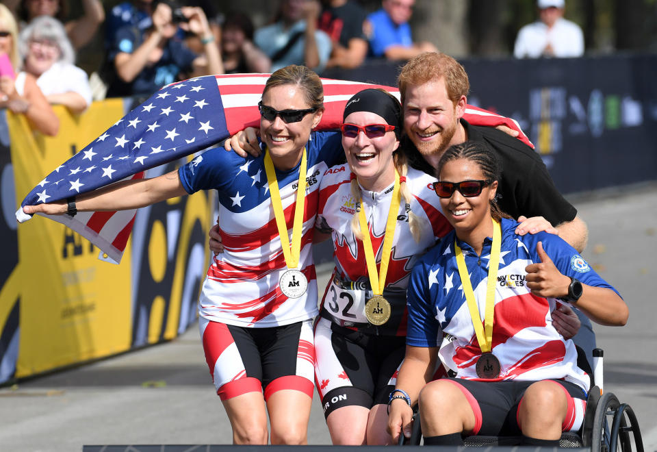 <p>The medalists from Tuesday's cycling competition pose with Prince Harry after he handed them their medals. Gabby Graves-Wake, an American Marine veteran and one of the winners, said that Harry joked with her when he gave her her cycling medal. "I had seen him yesterday at powerlifting and my coach had handed me the medals that I had won for my previous events of track and field," she told PEOPLE. "And today [Harry] was like 'Whoa, who's winning all the medals?'"</p>