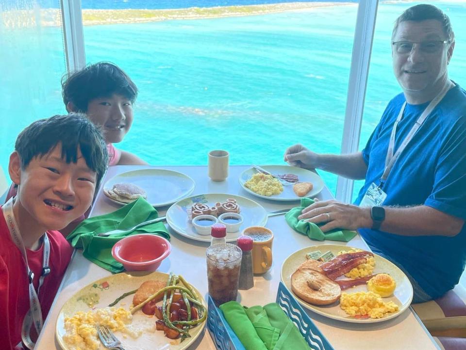 the writer's family eating breakfast on the disney magic