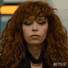 Nadia from Russian Doll staring ahead blankly