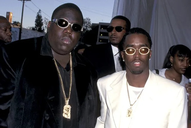 <p>Jim Smeal/Ron Galella Collection via Getty</p> The Notorious B.I.G. and Sean "Diddy" Combs in Los Angeles in 1997