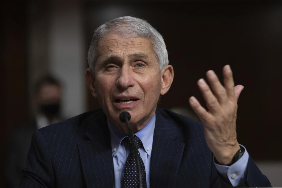 Dr. Anthony Fauci, Director of the National Institute of Allergy and Infectious Diseases at the National Institutes of Health, listens during a Senate Senate Health, Education, Labor, and Pensions Committee Hearing on the federal government response to COVID-19 Capitol Hill on Wednesday, Sept. 23, 2020, in Washington. (Graeme Jennings/Pool via AP)