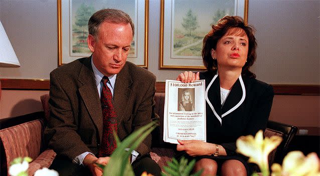 John and Patsy Ramsay hold up a flyer promising a $100,000 reward for information in 1997. Photo: Getty Images