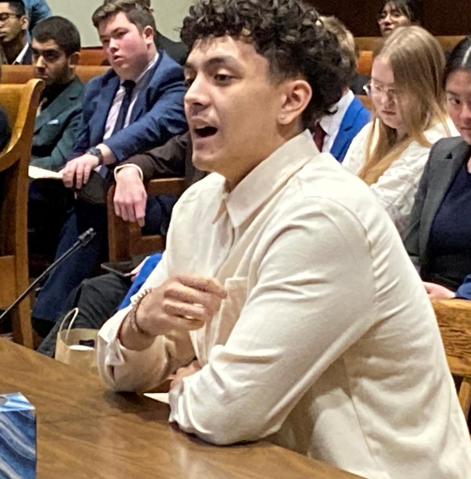 Javen Diaz, a Chelsea high school student, urges legislators at the Joint Committee on Education to establish financial literacy as a graduation requirement.