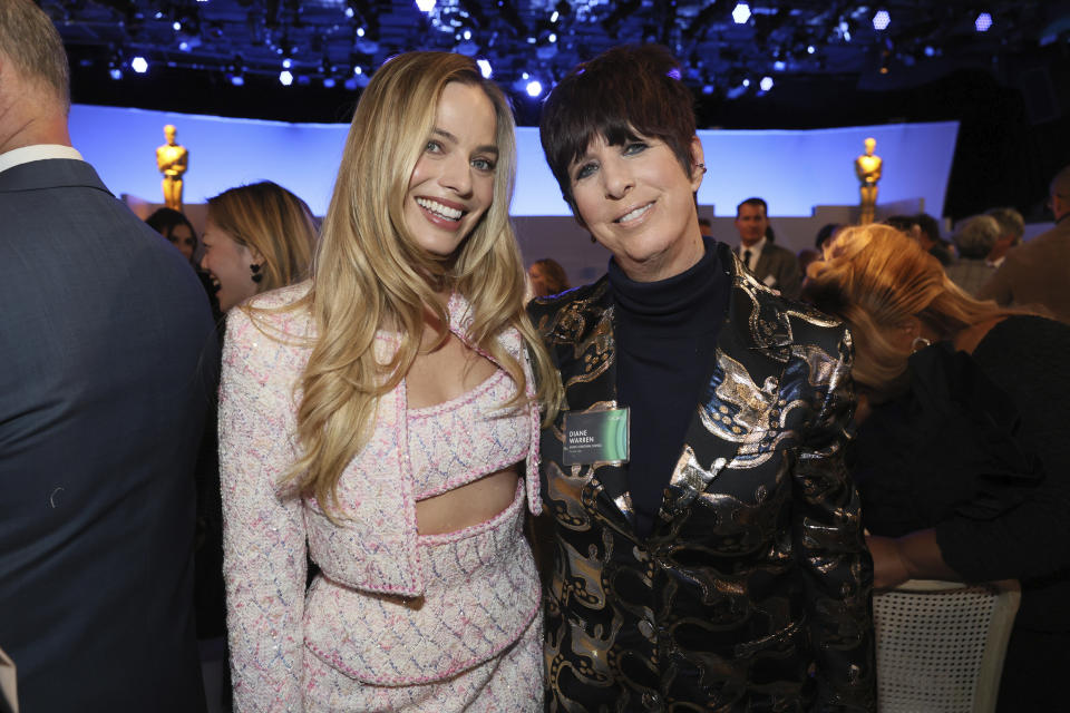 Margot Robbie, left, and Diane Warren attend the 96th Academy Awards Oscar nominees luncheon on Monday, Feb. 12, 2024, at the Beverly Hilton Hotel in Beverly Hills, Calif. (Photo by Danny Moloshok/Invision/AP)