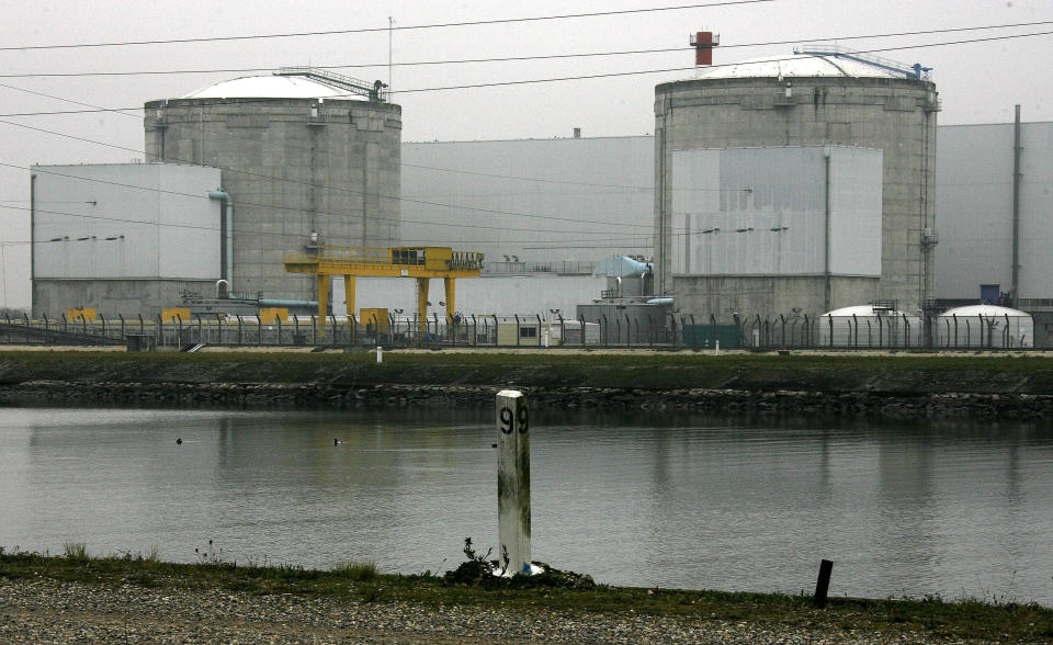 FILE - In this Nov. 30 2006 file picture the nuclear plant in Fessenheim, eastern France, is photographed. The French prime minister said in a statement that the first phase of the shut-down at Fessenehim, closing one of the reactors, will take place on Saturday. (AP Photo/Winfried Rothermel, File)