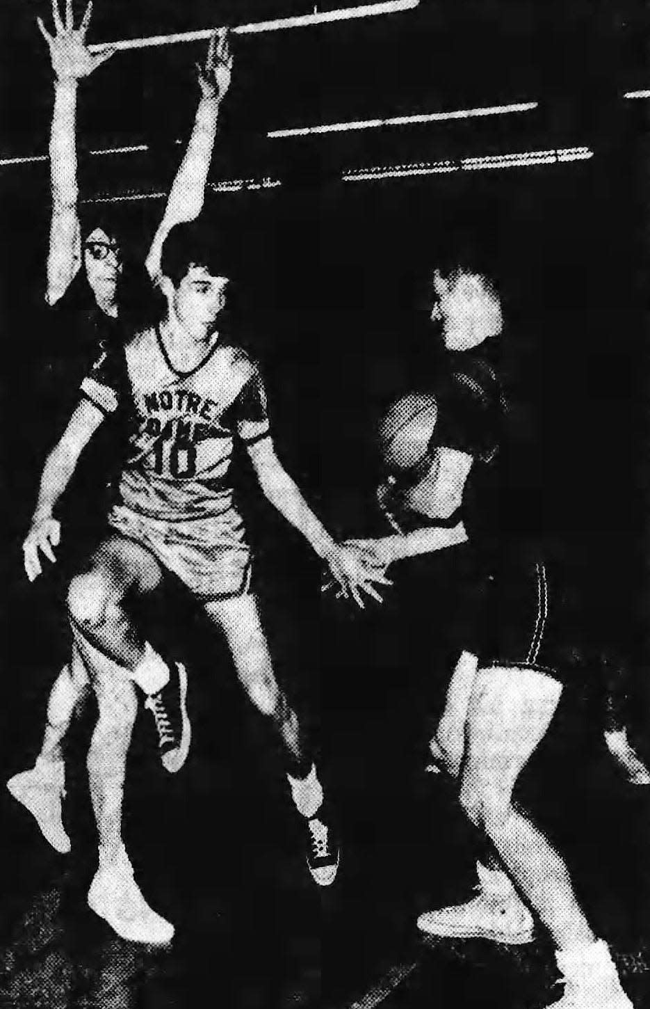 Elmira Notre Dame's Bill Huddle (10) plays against Elkland in a 1966 boys basketball game. Pictured at right is Mike Egleston, who went on to coach the Elkland girls basketball team to a Pennsylvania state championship in 1996.