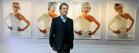 <div class="inline-image__caption"><p>Celebrity portrait photographer Mario Testino poses in front of the photographs that he captured of the late British Princess Diana at an exhibition in Kensington Palace in London, 22 November 2005.</p></div> <div class="inline-image__credit">CARL DE SOUZA/AFP via Getty Images</div>