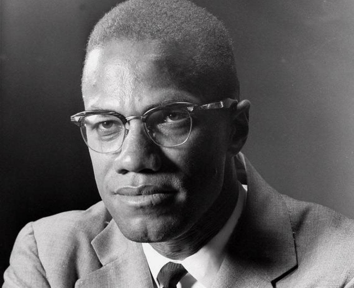 Malcolm X is shown in a 1964 portrait.