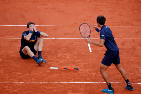 Tennis - French Open - Roland Garros, Paris, France - June 9, 2018 France's Pierre-Hugues Herbert and Nicolas Mahut celebrate after winning the men's doubles final against Austria's Oliver Marach and Croatia's Mate Pavic REUTERS/Gonzalo Fuentes