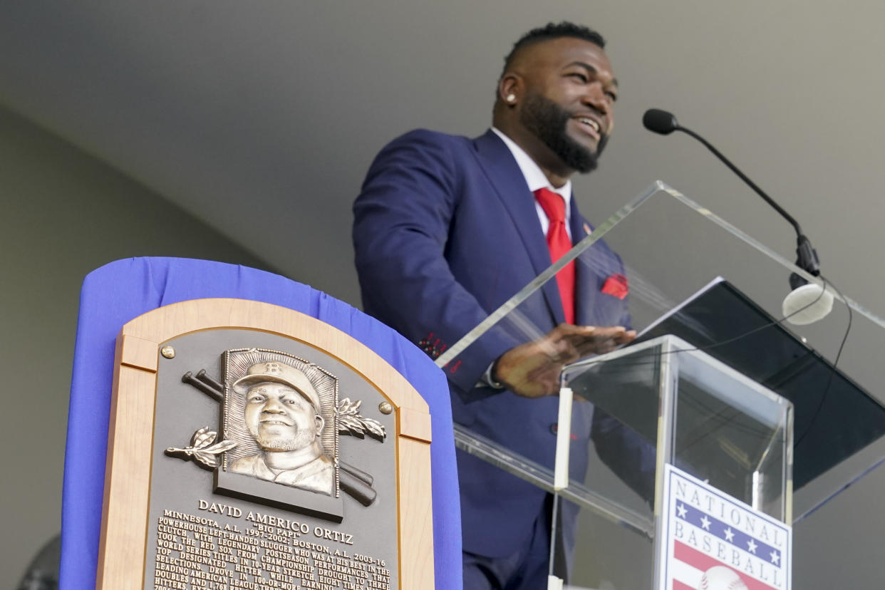 Hall of Fame inductee David Ortiz, formerly of the Boston Red Sox, speaks during the National Baseball Hall of Fame induction ceremony, Sunday, July 24, 2022, at the Clark Sports Center in Cooperstown, N.Y. (AP Photo/John Minchillo)