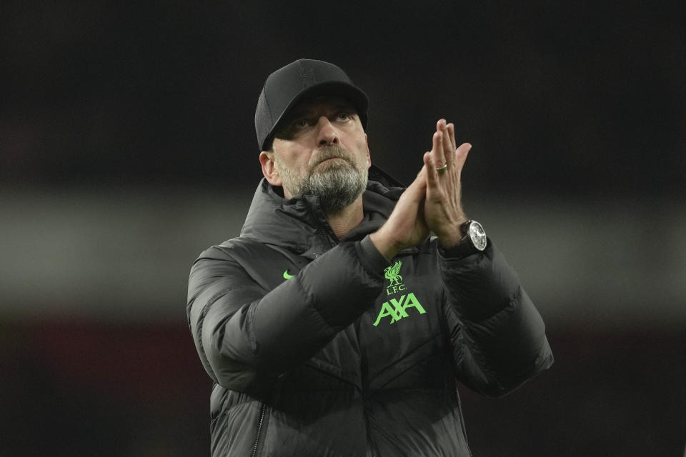 Liverpool's manager Jurgen Klopp applauded at the end of the English Premier League soccer match between Arsenal and Liverpool at Emirates Stadium in London,, Sunday, Feb. 4, 2024. (AP Photo/Kin Cheung)